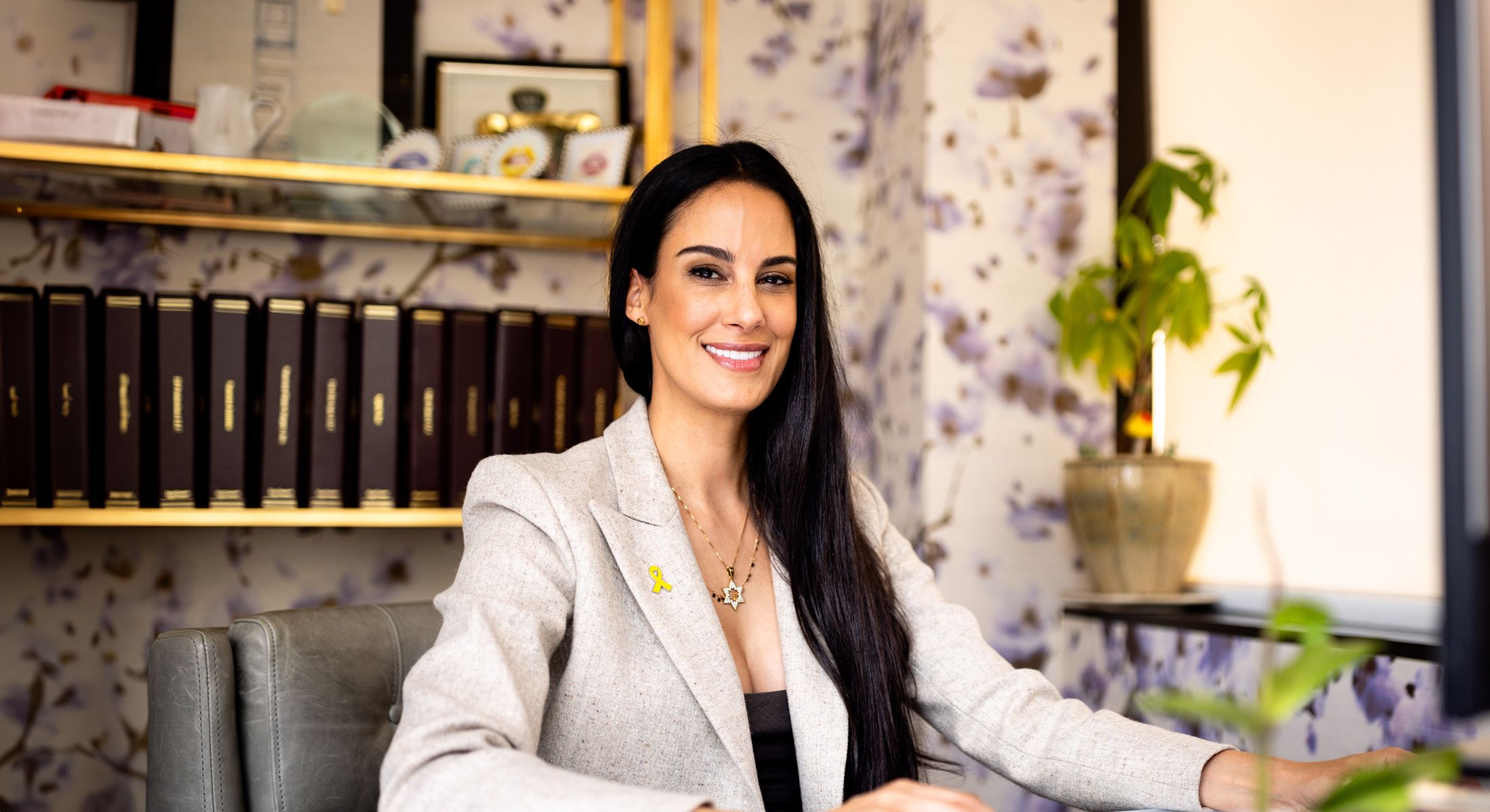 Professional woman working at a desk.