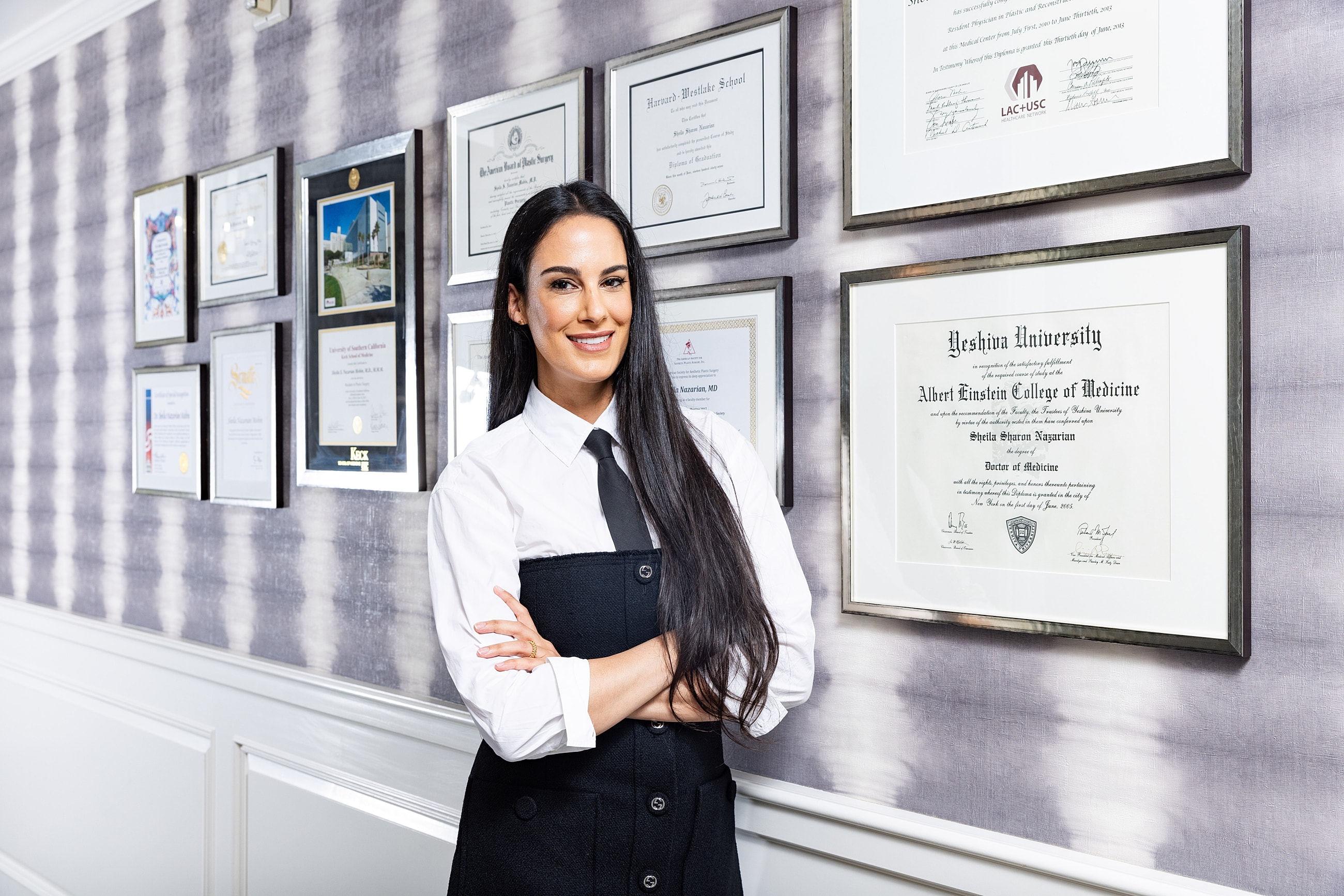 Man stretching his arm by the ocean.