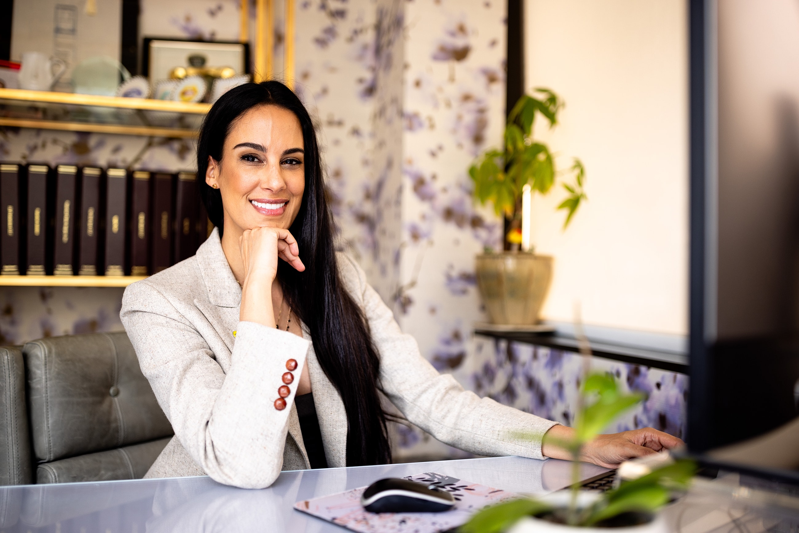 Woman stretching with earbuds in athletic attire
